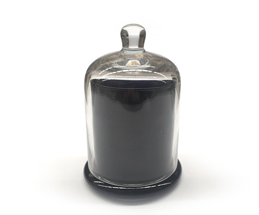 Clear cloch candle with black candle