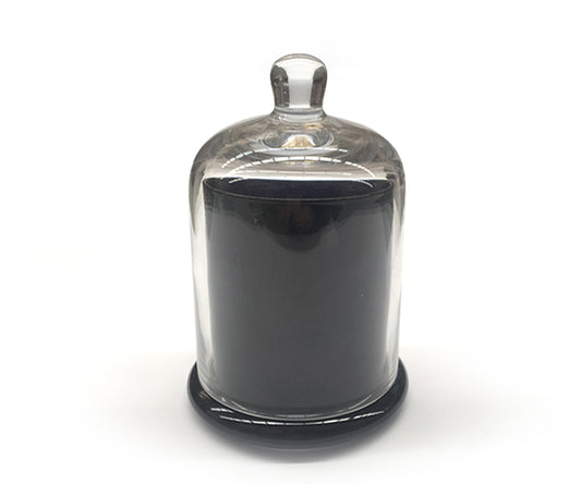 Clear cloch candle with black candle